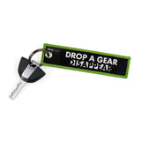 Drop A Gear And Disappear Keychain Key Tag - Gray